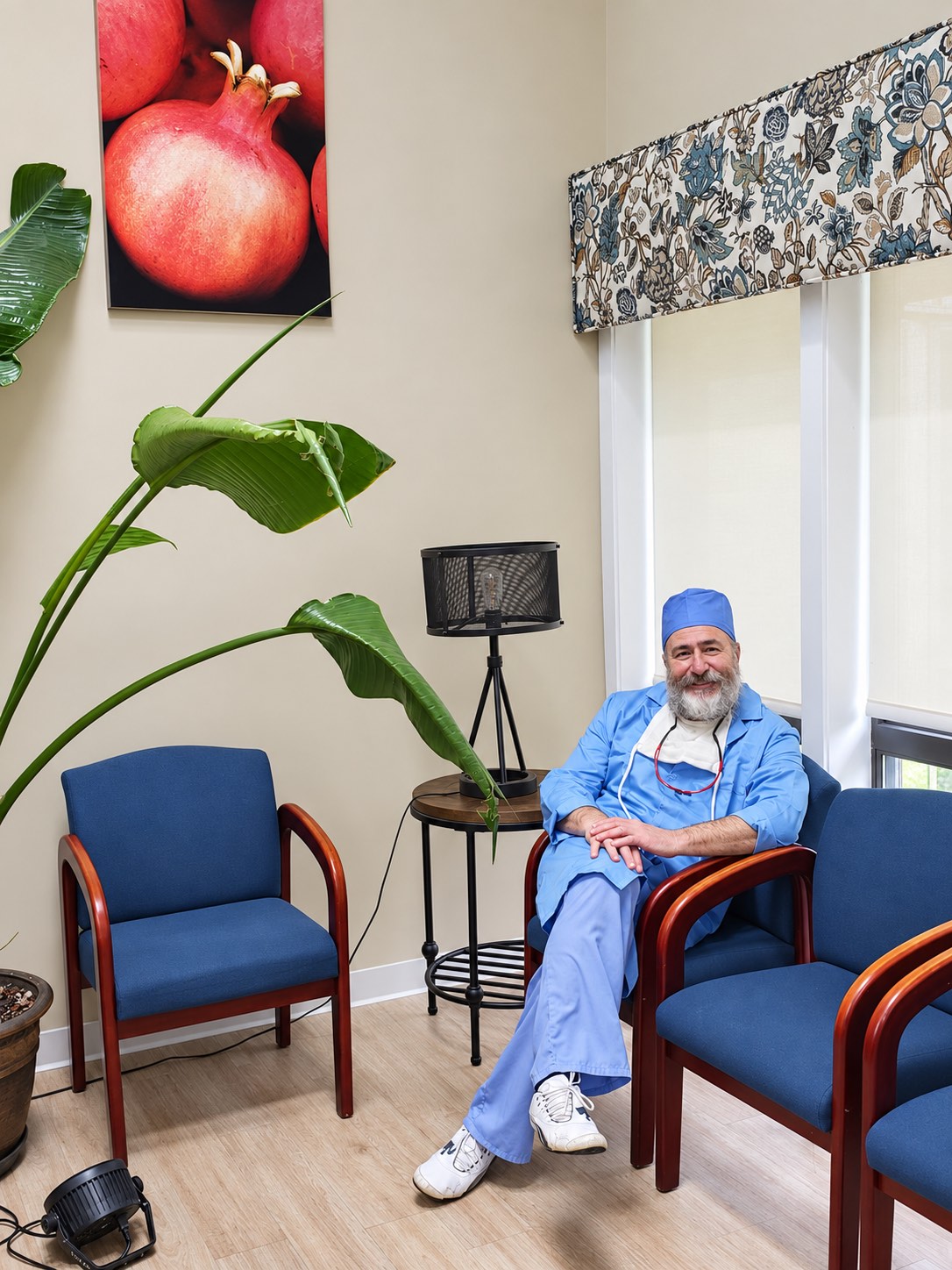 Dr. Rapoport seated in the office waiting room